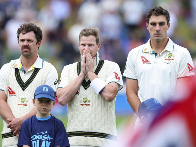 WELLINGTON, NEW ZEALAND - FEBRUARY 29: L to R, Travis Head, Steve Smith and Pat Cummins of Australia look on during day one of the First Test in the series between New Zealand and Australia at Basin Reserve on February 29, 2024 in Wellington, New Zealand. (Photo by Hagen Hopkins/Getty Images)