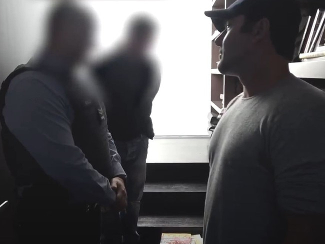 Mim Salvato talking to police officers during the raids of John Ibrahim’s house in 2017.