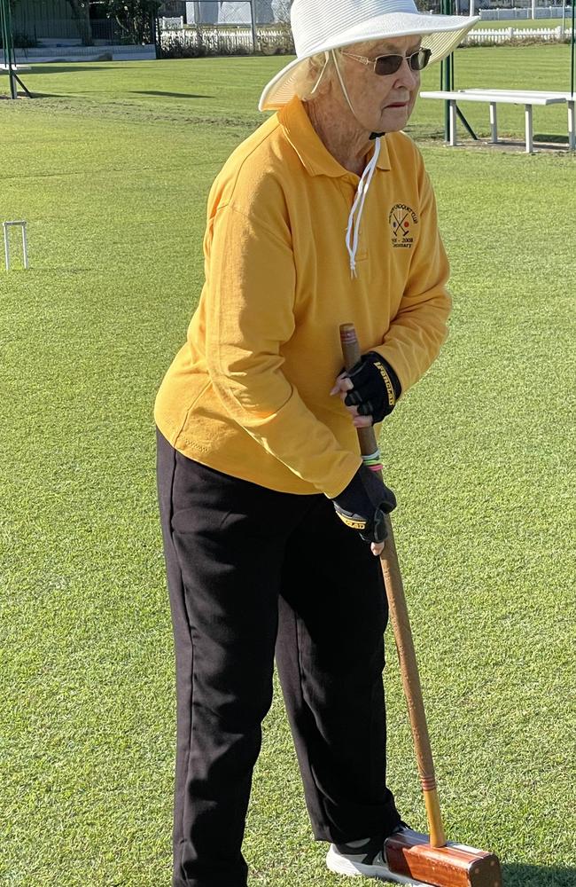 Dell Strike watching her ball through at the Mackay Croquet Club. Picture: Max O'Driscoll.