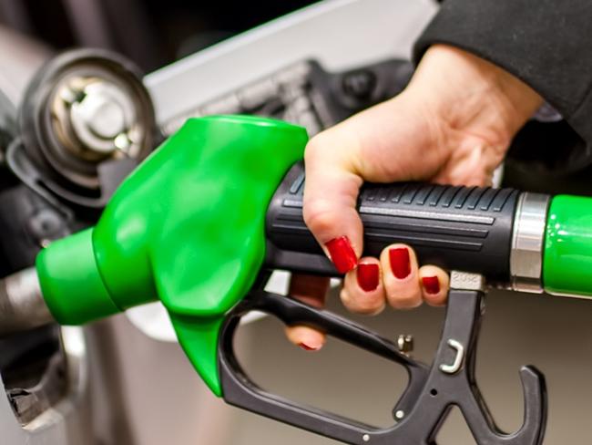 Generic photo - Petrol pump. woman pumping petrol in car at petrol station. Picture: iStock