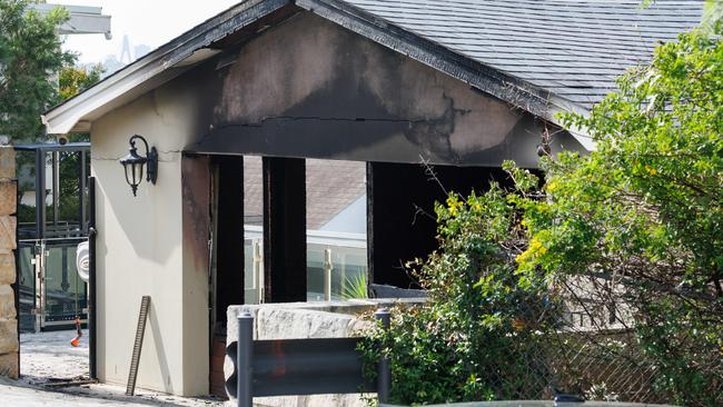 A Lamborghini and a Tesla were destroyed in a garage fire at Hunters Hill on Monday morning. Picture: David Swift