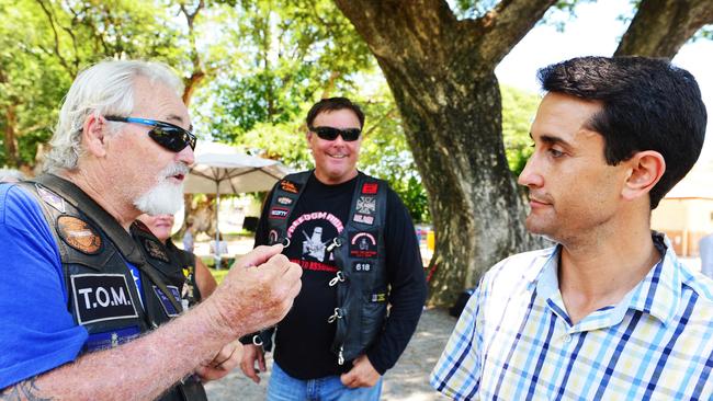 Crisafulli is confronted by members of the Freedom Riders Association Queensland in 2015, while handing out how to vote cards at Mundingburra State School. Picture: Zak Simmonds