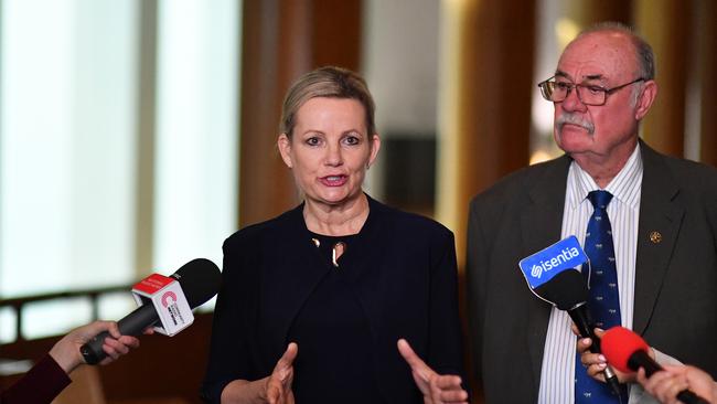 Environment Minister Sussan Ley and Great Barrier Reef Envoy Warren Entsch speak during a press conference in the Mural Hall at Parliament House last month.