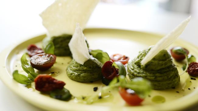 Spiced avocado mousse with salted baby cucumber, buttermilk and heirloom tomatoes. Picture: Richard Hatherly