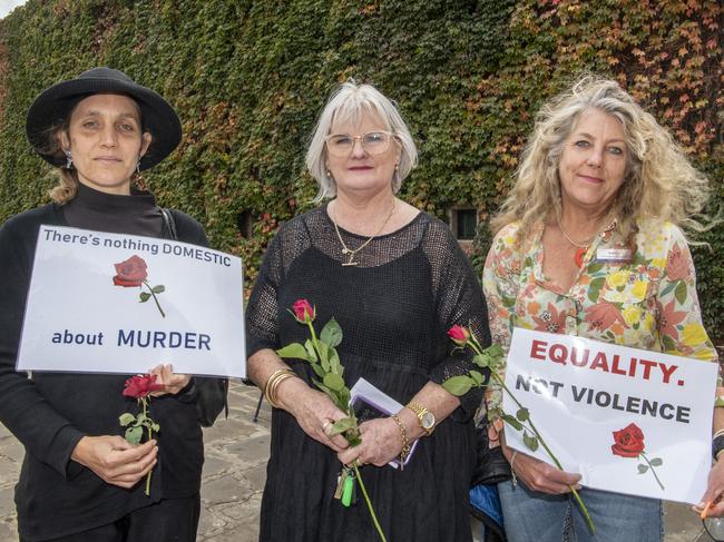 (From left) Sarah Raican, Kath Turley, DVAC Toowoomba service manager and Heather Roberts, Vulnerable Communities Darling Downs Health. Red Rose Rally held in Civic Square, Toowoomba to acknowledge domestic violence related deaths. Friday, April 30, 2021. Picture: Nev Madsen.