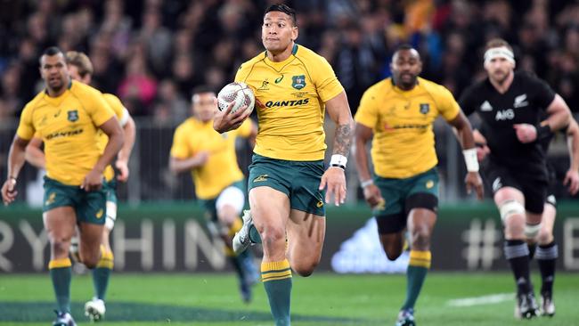 Israel Folau of Australia runs in the opening try against New Zealand. Picture: AAP