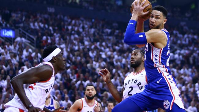 Ben Simmons is confronted by Toronto’s Pascal Siakam.