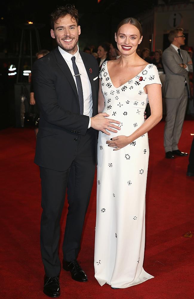 Actor Sam Claflin and Laura Haddock attend “The Hunger Games: Mockingjay Part 2” UK Premiere at the Odeon Leicester Square on November 5, 2015 in London. Picture: Getty