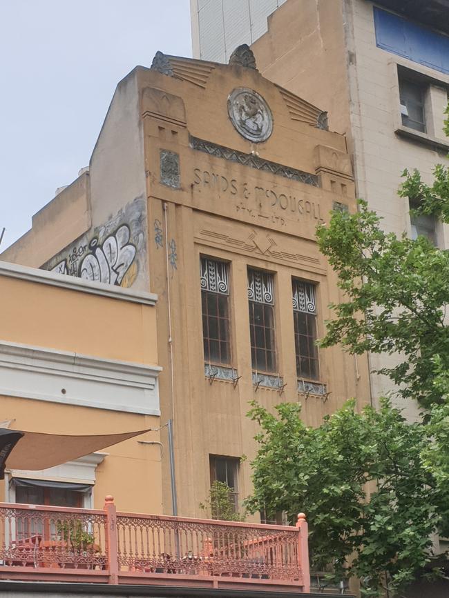 The heritage Sands and McDougall facade will be saved, as the surrounding Southern Cross Arcade is demolished. Picture: Colin James