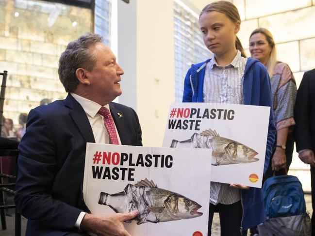 Swedish climate activist Greta Thunberg speaks to Australian businessman Andrew Forrest as she arrives for a Blue Leaders breakfast briefing in New York this week. Picture: AP Photo/Mary Altaffer