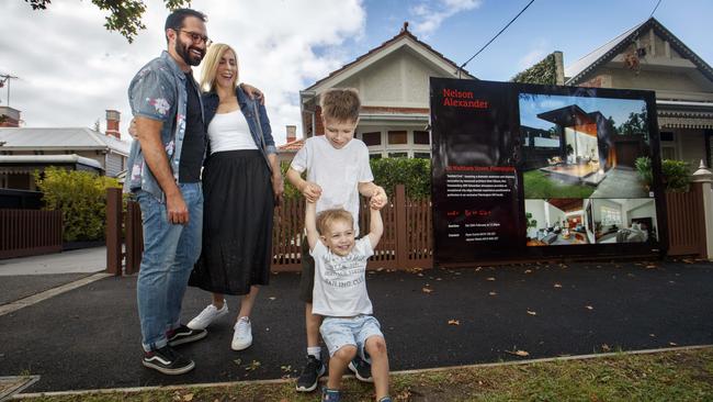 Mark and Caroline Ottley with sons Xander, 6, and Callum, 3, at their Melbourne house, which is for sale. Picture: David Geraghty