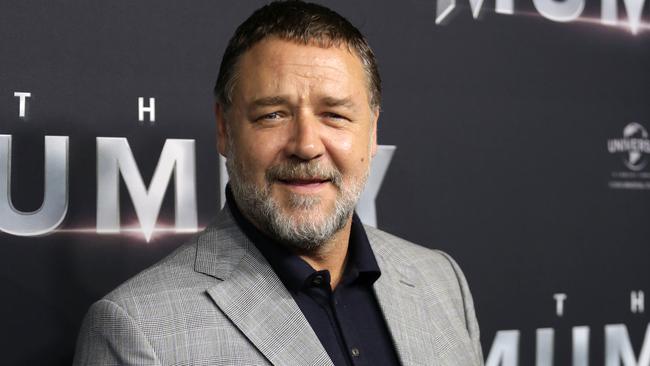 Russell Crowe, pictured in Sydney this year, has still not addressed claims he helped kill off a 2004 expose on Harvey Weinstein.