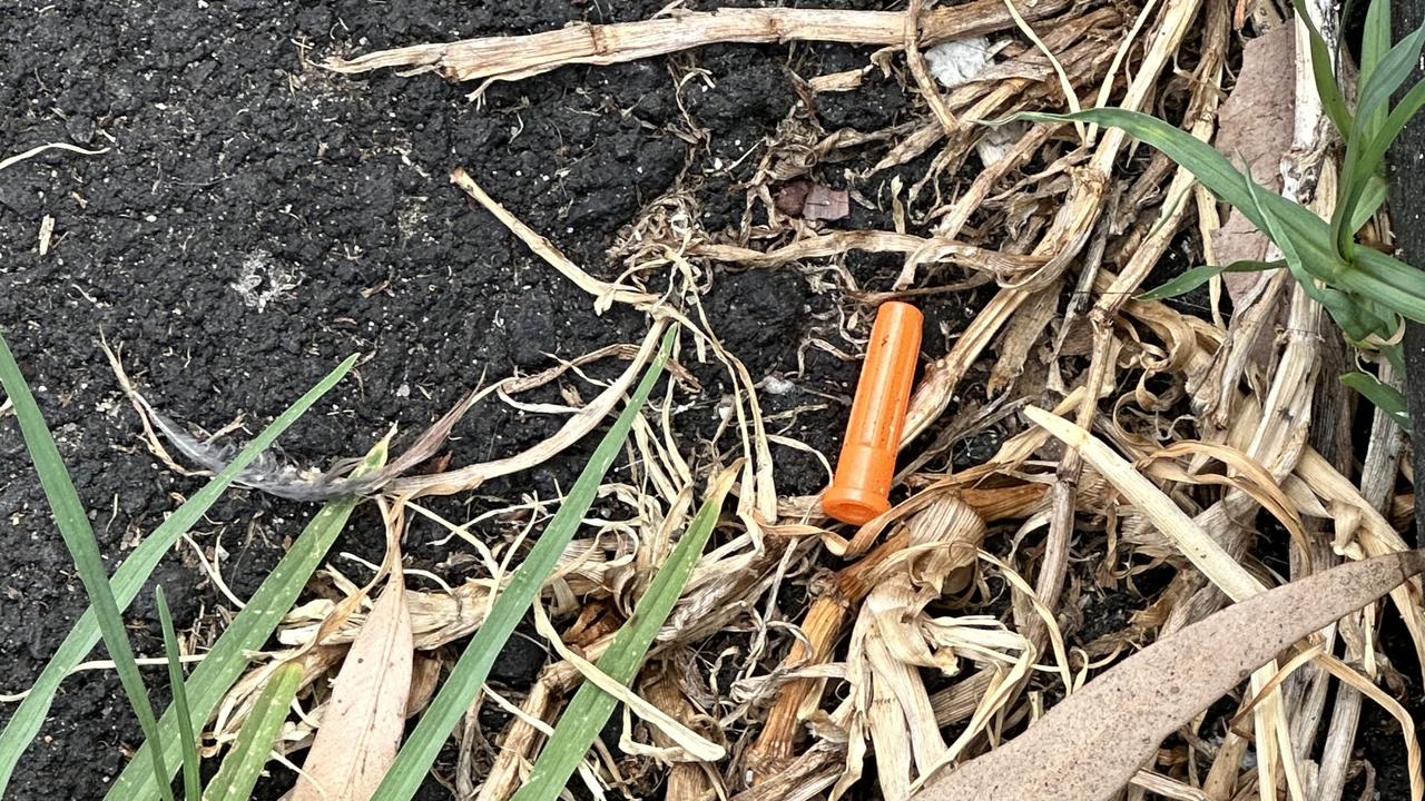 A syringe cap littered on the side of a footpath. Picture: news.com.au