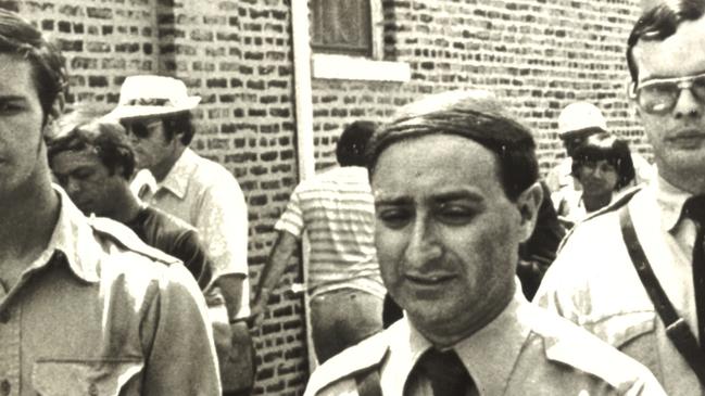 Frank Collin (centre) leaves his Nazi headquarters heading to a rally in a park in Chicago September 1978. UPI Photo