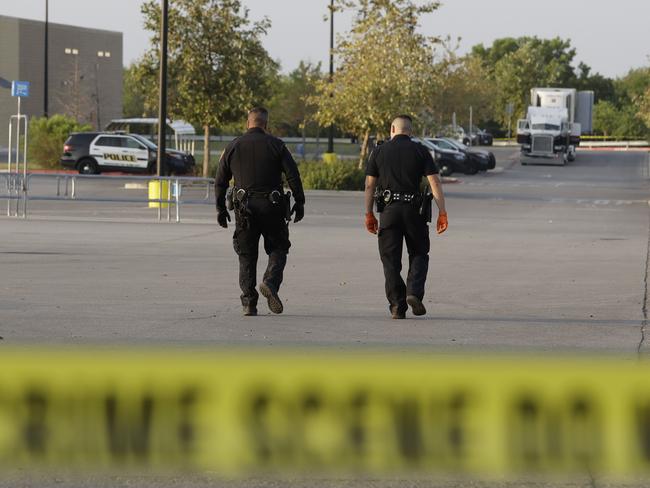 San Antonio police officers continue to investigate the scene where eight people were found dead and dozens of others injured. Picture: Eric Gay/AP