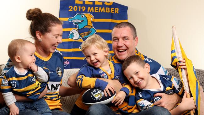 Lisa and Glenn Kayes with sons William, 6, Freddie, 3, and Charlie 9 months, at home in Glenwood. Picture: Jonathan Ng