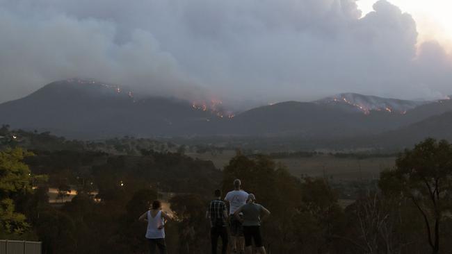 People look on as the Canberra fires burn. Picture: Getty Images