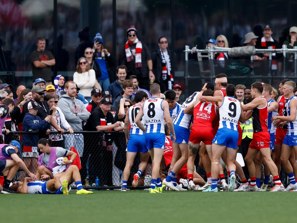 North Melbourne Players remonstrate after Jy Simpkin was floored. Picture: Dylan Burns/AFL Photos