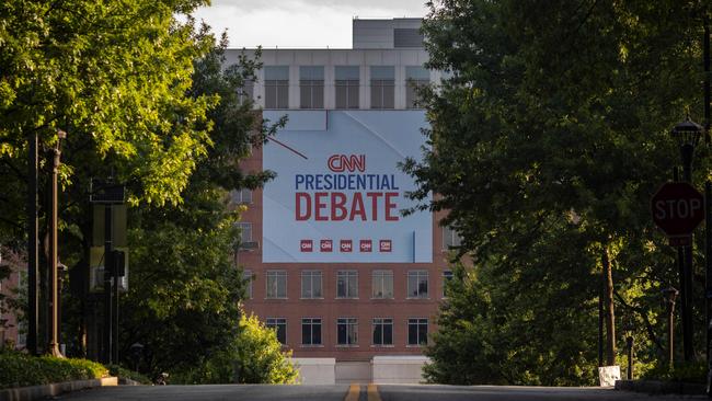 Banners are placed outside CNN studios ahead of the first presidential debate in Atlanta, Georgia. Picture: AFP.