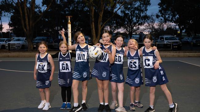 Lara White under-11 netball team pull their funniest faces.