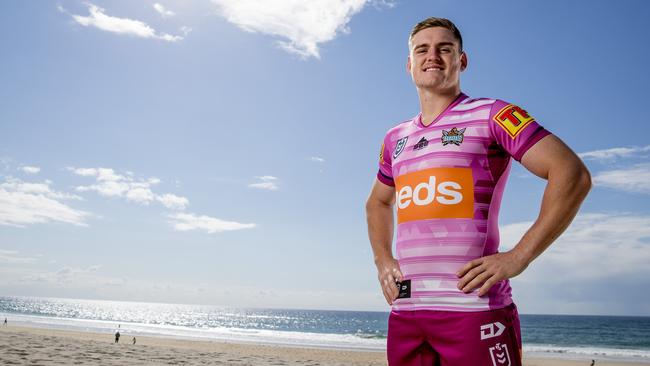 Titans player AJ Brimson wearing the new pink jersey for the women in league round. Picture: Jerad Williams