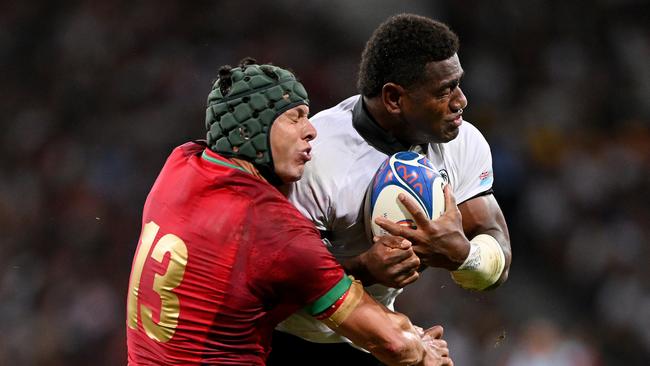 Josua Tuisova of Fiji is tackled by Pedro Bettencourt of Portugal during the Rugby World Cup France 2023 match at Stadium de Toulouse. Picture: Getty Images