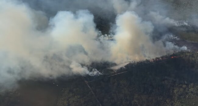 Water bombing aircraft were called in to support firefighters battling a bushfire at Beerwah. Picture: Queensland Fire and Emergency Service