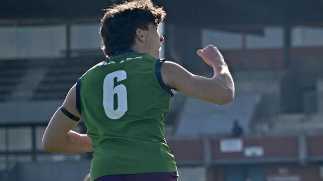 Seb Murphy celebrates a goal for Parade College. Picture: Andy Brownbill