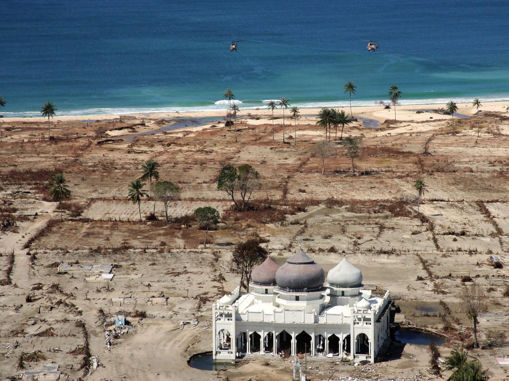 A partly damaged mosque in the Lampuuk coastal district of Banda Aceh on Indonesia's Sumatra island, AFP PHOTO / FILES / JOEL SAGET