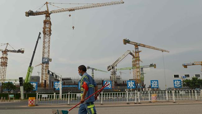 The liquidity crisis sweeping through the Chinese property sector is prompting apartment buyers to stop paying mortgages on uncompleted building work. Picture: AFP.