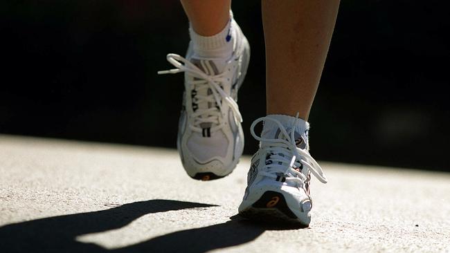 Generic picture of a person jogging. Sneakers, running, shoes, footwear, walking, physical fitness, exercise. Feet.