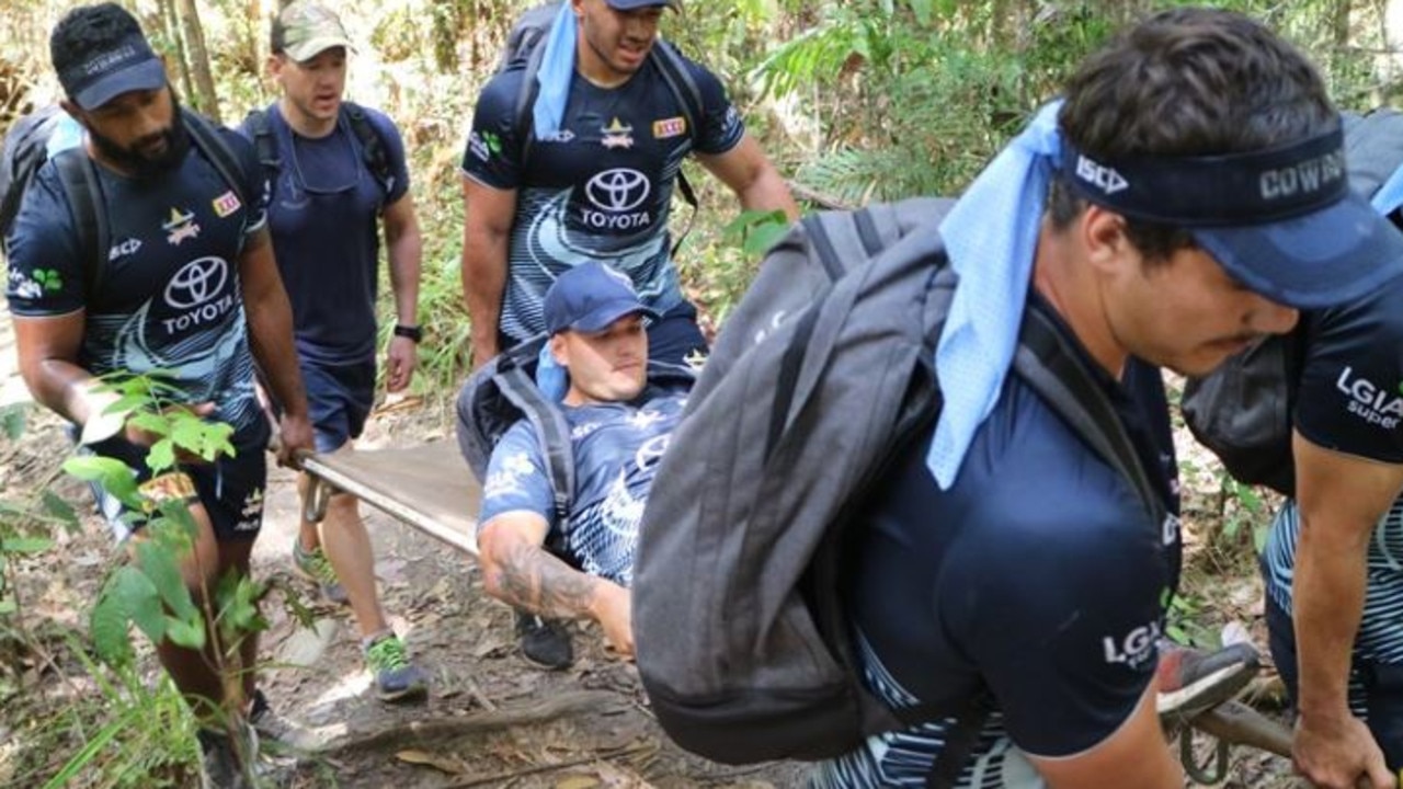 Cowboys players take part in a camp.