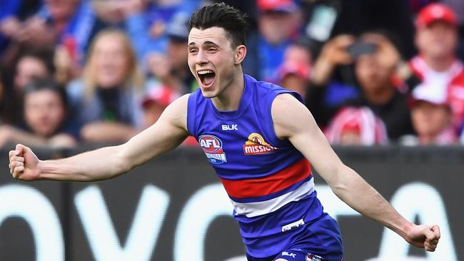 Toby McLean celebrates after the 2016 Grand Final siren.