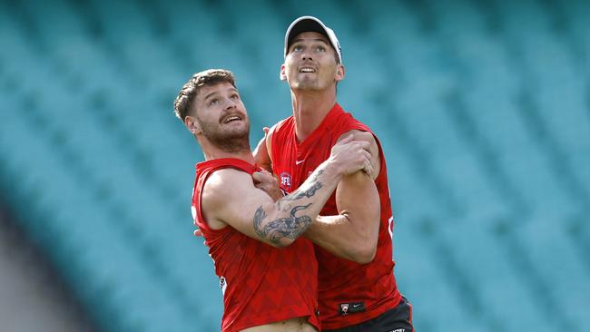 Peter Ladhams and Lachlan McAndrew wrestle at Sydney training. Picture: Phil Hillyard