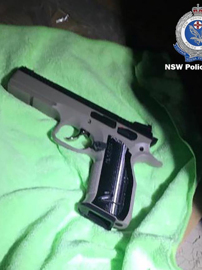 A handgun seized in raid. Pictures: NSW Police