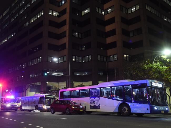 Police allege the driver had been working about 21 hours without a break when his passenger stepped out into the path of a bus. Picture: Gordon McComiskie