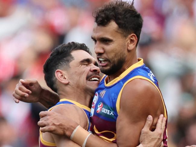 MELBOURNE , AUSTRALIA. September 28, 2024. AFL Grand Final between the Brisbane Lions and Sydney Swans at the MCG. Lions Charlie Cameron celebrate Callum Ah Chee goal. Picture: David Caird