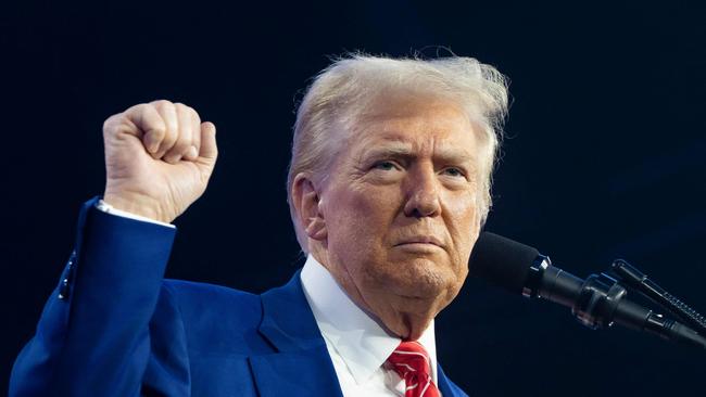 PHOENIX, ARIZONA - DECEMBER 22: U.S. President-elect Donald Trump speaks during Turning Point USA's AmericaFest at the Phoenix Convention Center on December 22, 2024 in Phoenix, Arizona. The annual four day conference geared toward energizing and connecting conservative youth hosts some of the country's leading conservative politicians and activists.   Rebecca Noble/Getty Images/AFP (Photo by Rebecca Noble / GETTY IMAGES NORTH AMERICA / Getty Images via AFP)