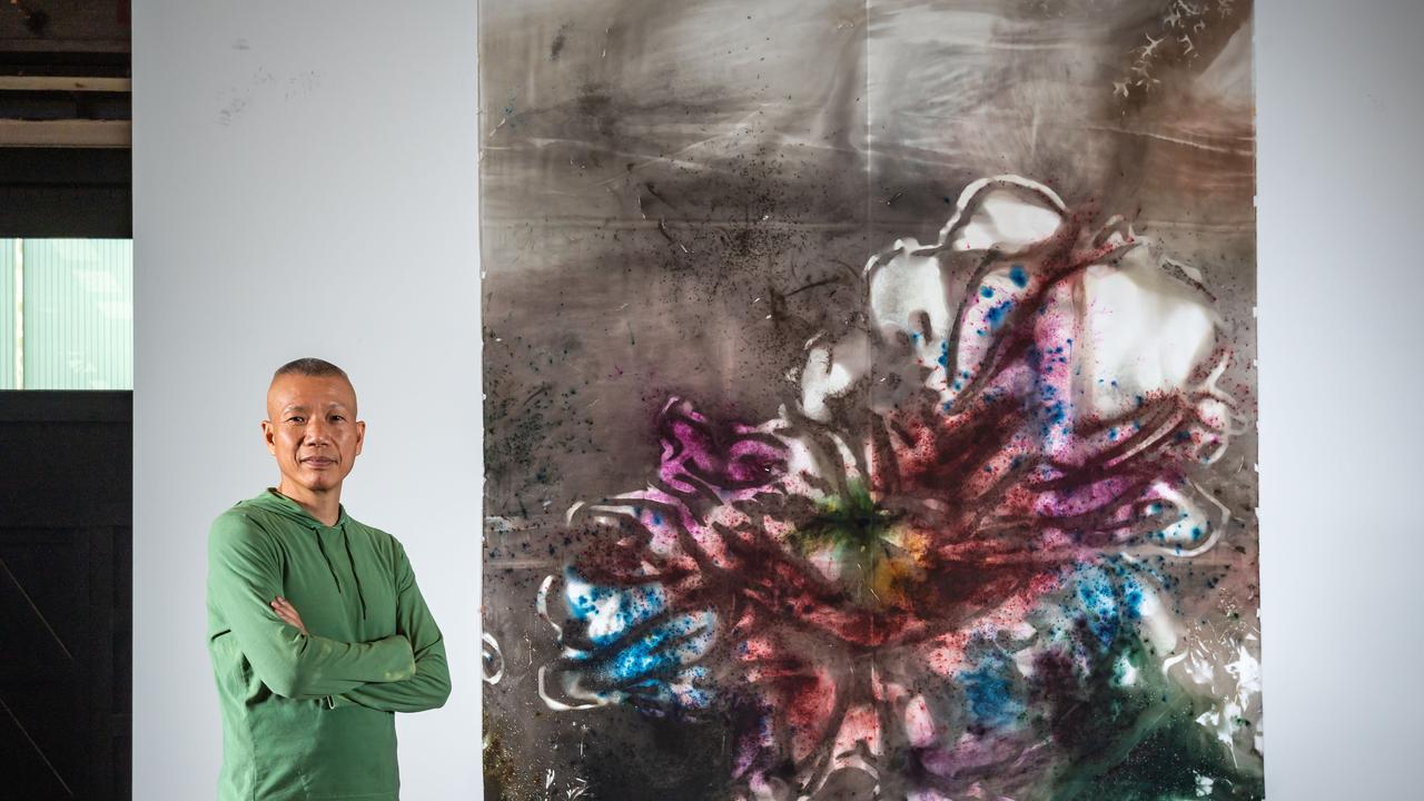 Chinese contemporary artist Cai Guo-Qiang creates a new phenomenal 31m gunpowder painting, Transience II (Peony). Picture: Jason Edwards