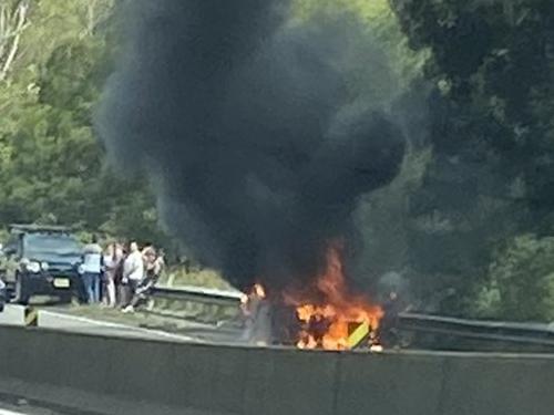 Emergency services are on scene fighting the 'massive car fire'. Picture: Twitter