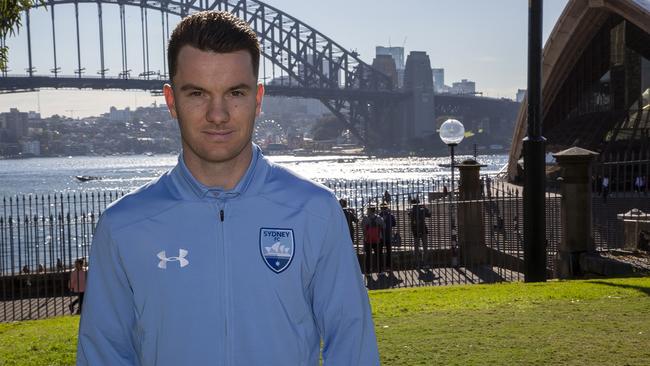 Alexander Baumjohann all smiles in front of the iconic Opera House and Harbour Bridge. Photo by Amos Hong/Sydney FC