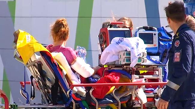 Sarah Peet being transported to Hervey Bay Hospital after a dingo attack on K'Gari. Picture: Seven News Brisbane