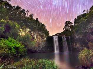 THE STARS SPIN BRIGHT: Dangar Falls as captured by   Advocate   r e ader Adam Dederer in this stunning landscape using a long exposure bulb setting. Picture: Adam Dederer