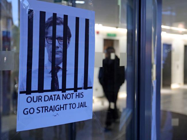 Posters depicting Cambridge Analytica's CEO Alexander Nix behind bars, with the slogan "Our Data Not His. Go Straight To Jail" at the entrance of the company's offices in central London. Picture: AFP