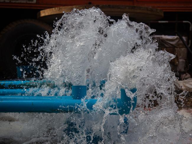 Water pumps worked round the clock to keep water levels manageable. Picture: Getty Images