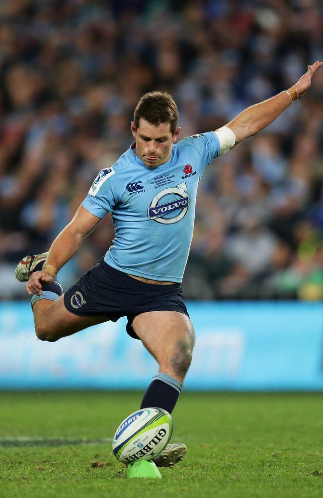 Bernard Foley kicks the winning penalty goal for the Waratahs in the Super Rugby final.