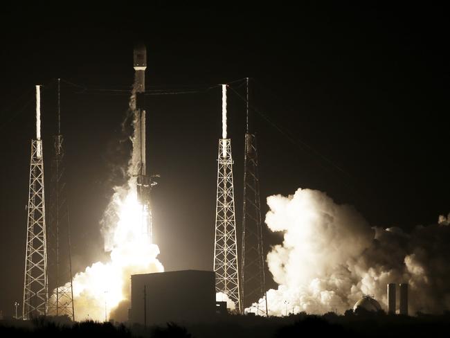 A SpaceX Falcon 9 rocket lifts off with Israel's Lunar Lander and an Indonesian communications satellite at space launch complex 40, Thursday, Feb. 21, 2019, in Cape Canaveral, Fla. An Israeli spacecraft blasted off to the moon in an attempt to make the countryâ€™s first lunar landing, following a launch Thursday night by SpaceX. (AP Photo/Terry Renna)