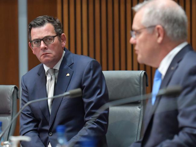 CANBERRA, AUSTRALIA - DECEMBER 11: Australian Prime Minister Scott Morrison (right) together with State Premiers Annastacia Palaszczuk (left), Daniel Andrews (centre) address the media in the Main Committee Room at Parliament House, on December 11, 2020 in Canberra, Australia. Australia's leaders are meeting face to face for the first time in nine months, after Prime Minister Scott Morrison convened 32 virtual meetings of the National Cabinet with premiers and chief ministers since March to coordinate responses to COVID-19. (Photo by Sam Mooy/Getty Images)