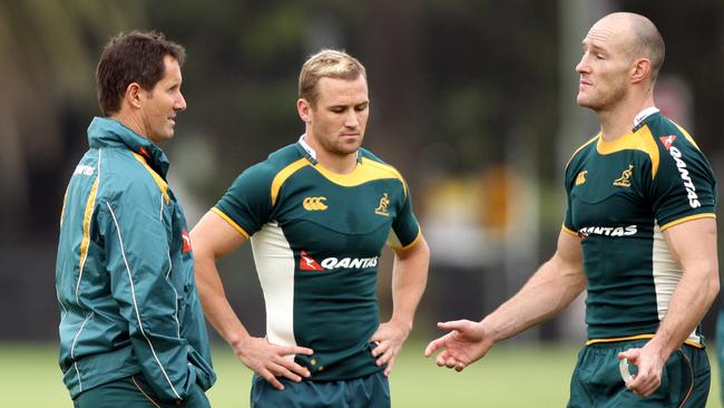 Robbie Deans talks to Matt Giteau and Stirling Mortlock, one of whom is the answer to Q27. Picture: Gregg Porteous