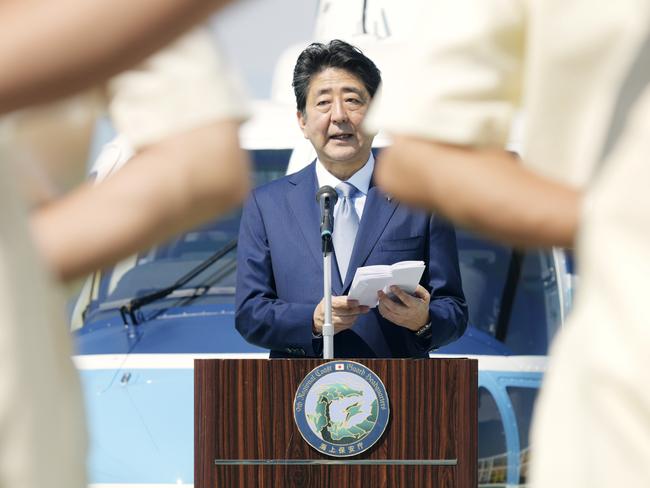 Japanese Prime Minister Shinzo Abe is seen addressing the sailors during a ship tour of the Japan Coast Guard vessel PLH08 Echigo at Fort Hill Wharf in Darwin, Northern Territory, Australia, Saturday, November 17, 2018. Mr Abe is in Darwin with wife Akie visiting Australia on an official two day visit to discuss bilateral and international issues with Australian officials. (AAP Image/Michael Franchi) NO ARCHIVING